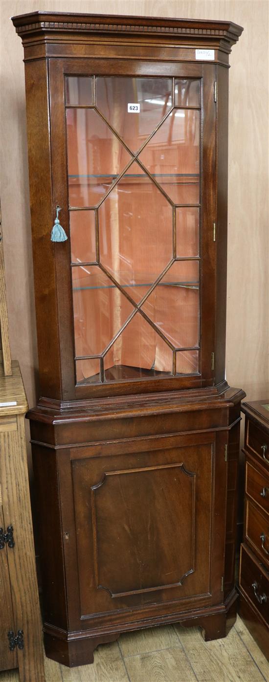 A reproduction mahogany standing corner cupboard, H.183cm